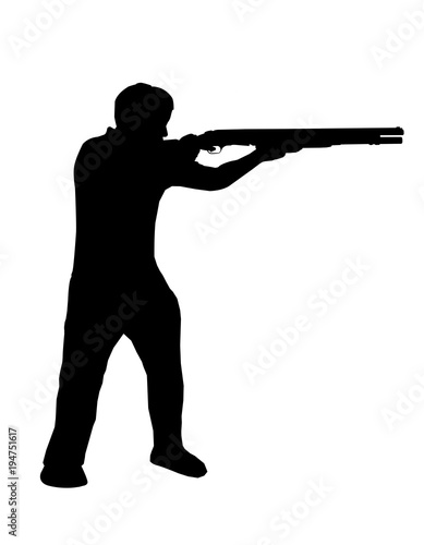 silhouette man  holding shotgun in a shooting position