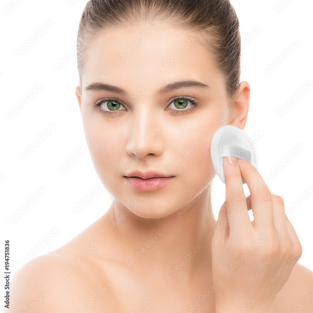 Young girl cares for face skin relaxation. Beautiful young brunette woman with clean perfect fresh skin using cotton pad. Youth and skin care concept. Isolated on a white. Young girl cares for face skin relaxation. Beautiful young brunette woman with clean perfect fresh skin using cotton pad. Youth and skin care concept. Isolated on a white.