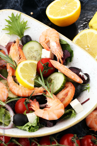 tasty meal with fresh and healthy prawn salad and vegetables. Prawns Langostino Austral.