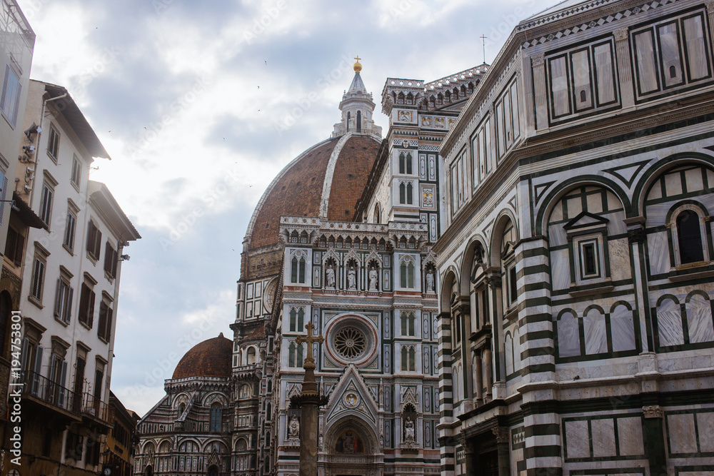 Detailed street view of the Cathedral of Santa Maria del Fiore, Florence or Firenze, Tuscany, Italy with sunlight