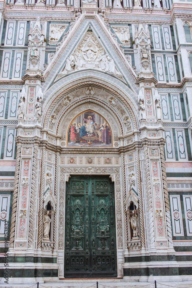 Detailed street view of the Cathedral of Santa Maria del Fiore, Florence or Firenze, Tuscany, Italy with sunlight