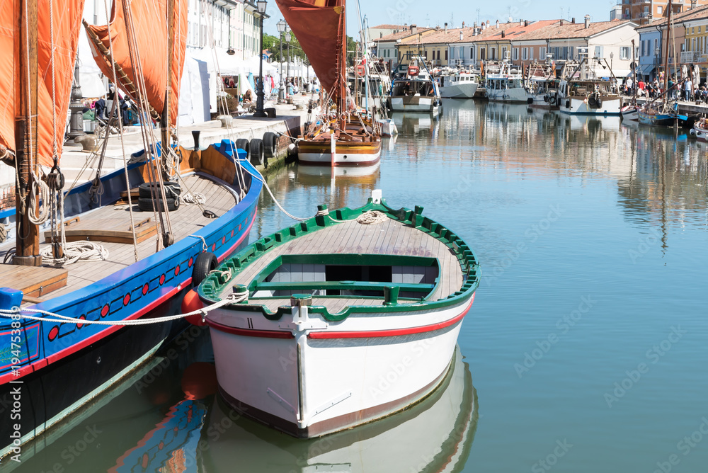 Historic sailing boats in the port of Cesenatico Italy