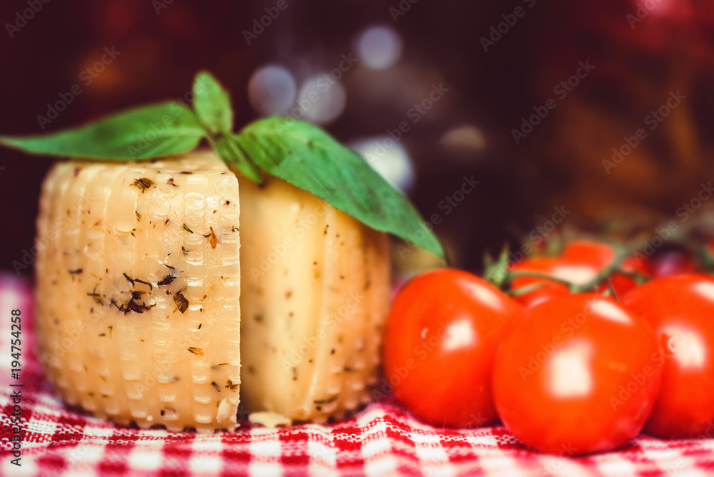 Rustic cheese with herbs and tomatoes Rustic cheese with herbs and tomatoes