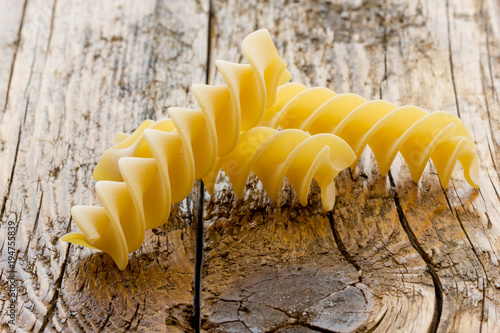 Uncooked pasta fusilli of Italy photo