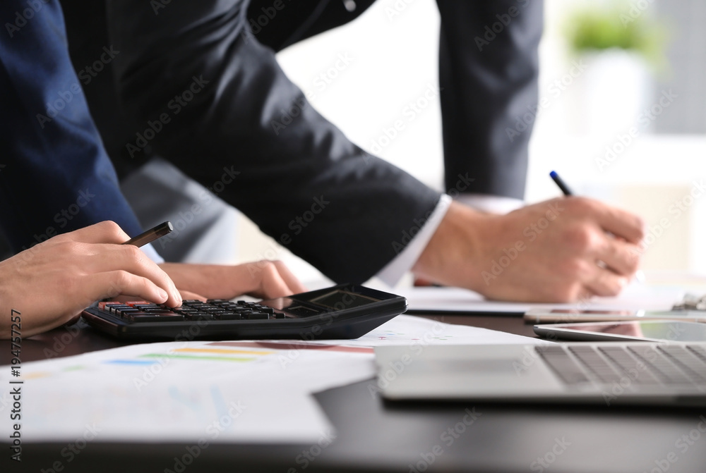 Young men working in office. Consulting service concept Young men working in office. Consulting service concept