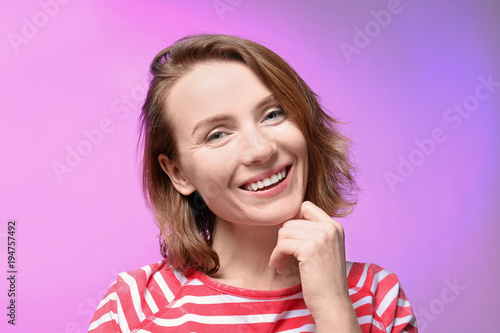 Portrait of smiling woman o...