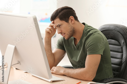 Young man working in office