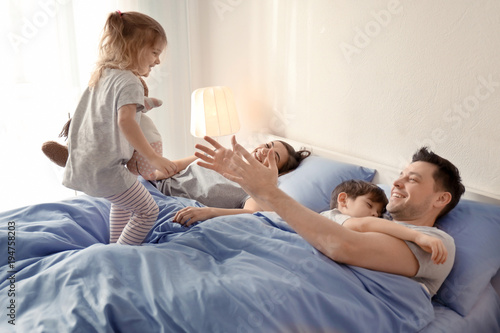 Cute awaken girl playing ne...