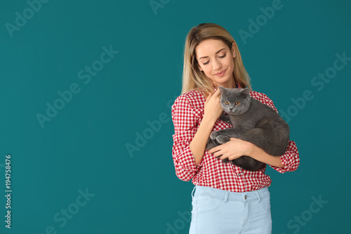 Young woman with cute pet c...