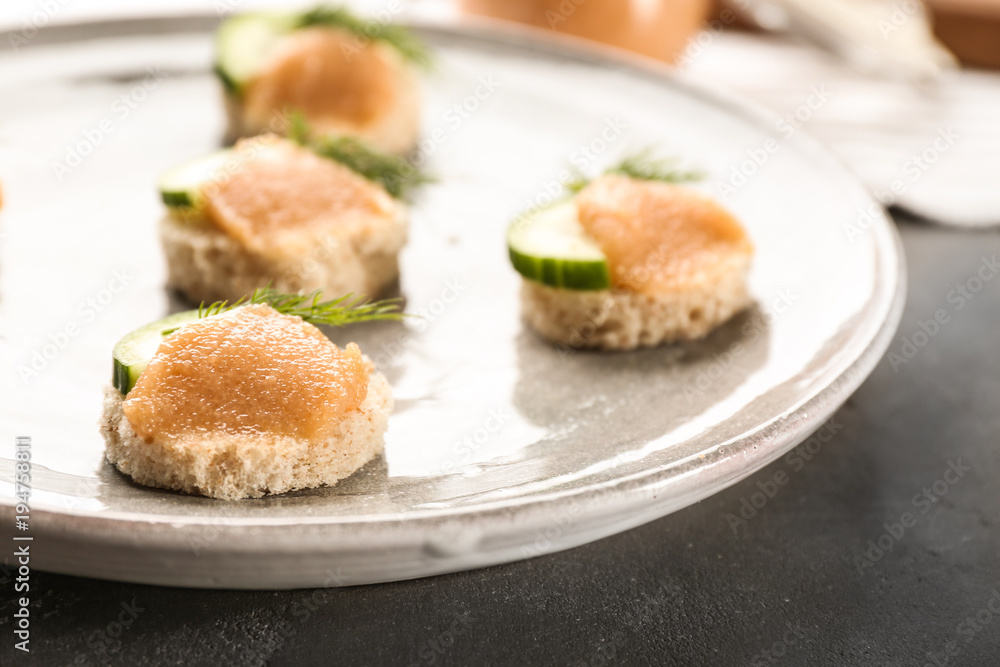 Tasty appetizer with codfish caviar on plate, closeup Tasty appetizer with codfish caviar on plate, closeup