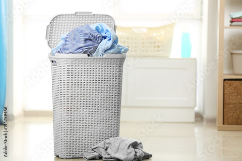 Laundry basket with dirty c...