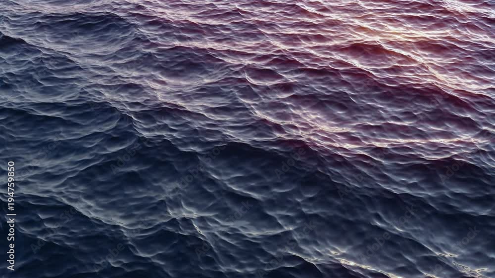 Sea wave close up, low angle view, slow motion sunrise or sunset shot Sea wave close up, low angle view, slow motion sunrise or sunset shot