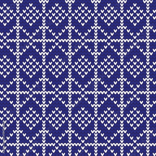 Abstract knitted pattern, white on a blue background using geometric shapes of squares, rhombuses. For design and decoration, fabrics.