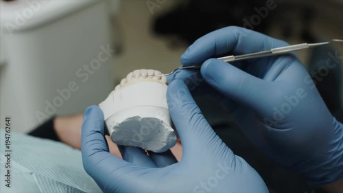 Dentists with a patient during a dental intervention to boy. Dentist Concept photo