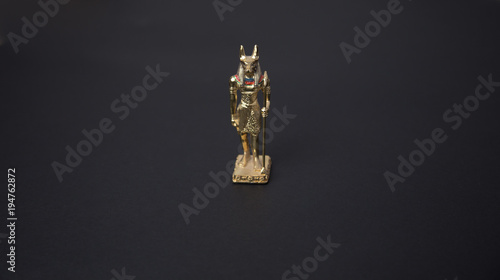 Anubis is the god associated with mummification and the afterlife in ancient Egyptian religion, usually depicted as a canine or a man with a canine/dog head