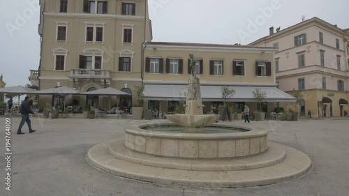Wallpaper Mural Round water fountain with statue in Rovinj Torontodigital.ca