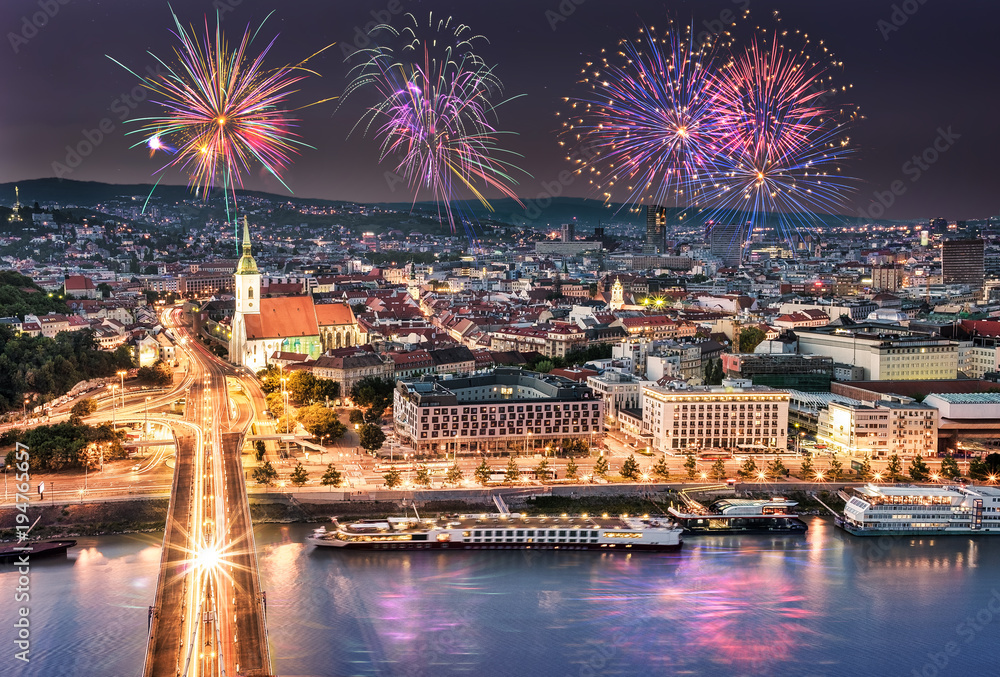 Fireworks over the Old Town in Bratislava, new bridge over Danube river with evening lights in capital city of Slovakia,Bratislava