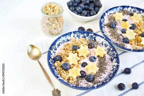 Fresh Breakfast Yogurt with Muesli Banana Berries Chia Seeds Granola White Background Healthy Lifestyle