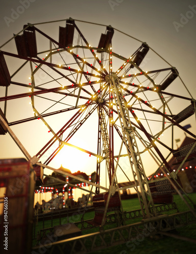 Photography Carnival midway background with Ferris wheel and carousel