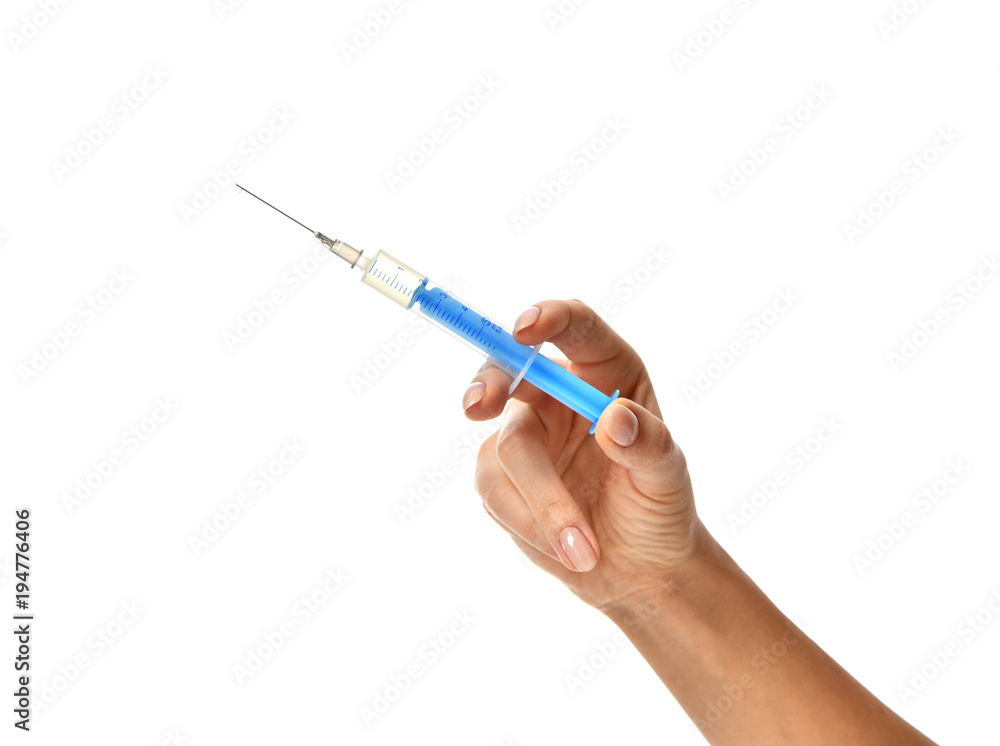 Doctor hand with medical syringe in hand ready for injection Doctor hand with medical syringe in hand ready for injection
