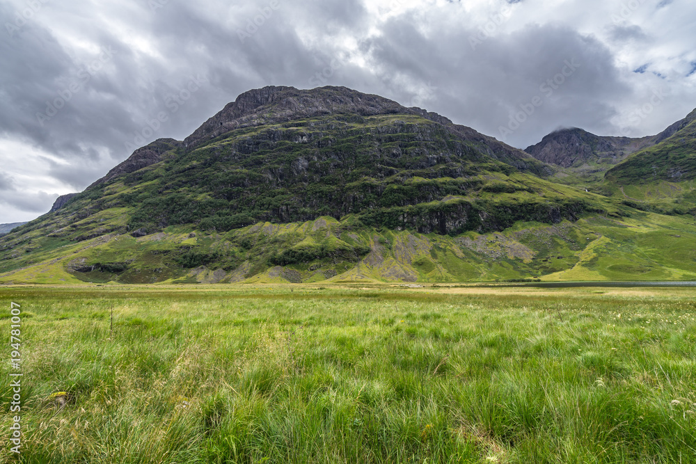 Scenic mountainous landscape in Glencoe valley, Highlands, Scotland, Britain