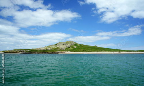 Uninhabited island "Ireland's Eye".View from the sea.