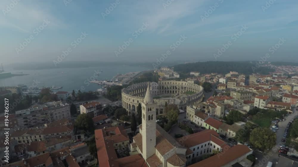 Church steeple and the Roman Arena, aerial view Church steeple and the Roman Arena, aerial view