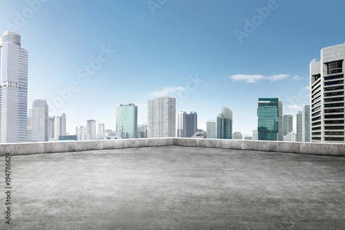 The roof of building with skyscrapers view photo