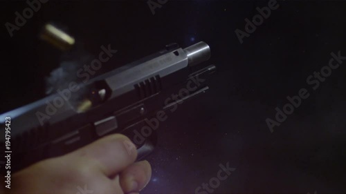 Wallpaper Mural Automatic gun firing two bullets, Ultra Slow Motion Torontodigital.ca