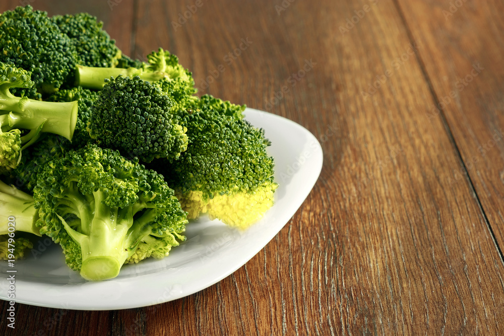 Healthy Green Organic Raw Broccoli Florets Ready for Cooking. The concept of healthy eating, detox. copy space Healthy Green Organic Raw Broccoli Florets Ready for Cooking. The concept of healthy eating, detox. copy space