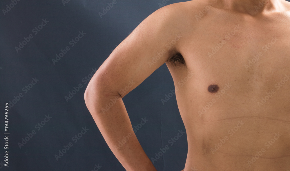 Young and healthy man shirtless show his muscles. Young and healthy man shirtless show his muscles.