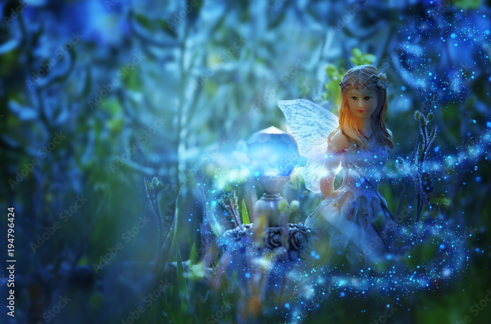 image of magical little fairy in the night forest. image of magical little fairy in the night forest.