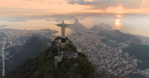 Aerial view of Christ the Redeemer Statue and Botafogo Bay. Morning sunrise light, Rio de Janeiro, Brazil photo
