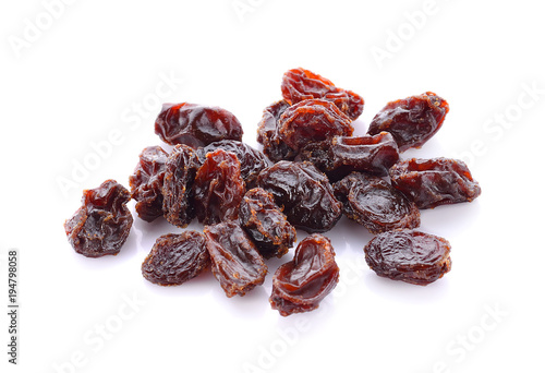 Raisins on a white background.