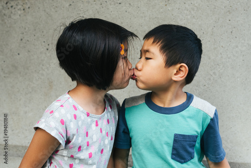 Photo Stock Boy Girl Fraternal Twin Young Children Kissing On The Lips Adobe Stock