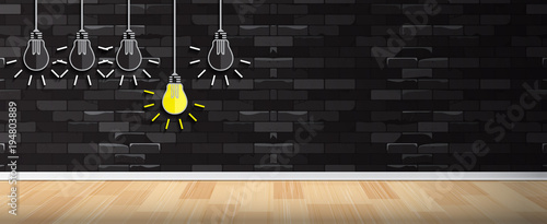 Light bulb concept idea on wall.