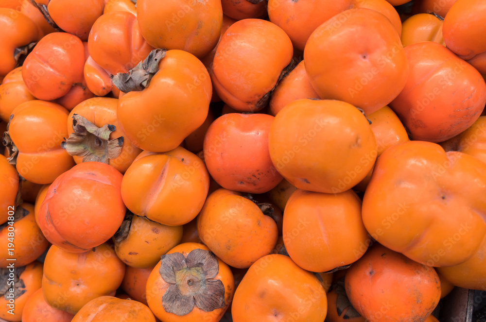New fresh persimmon at city market for sale