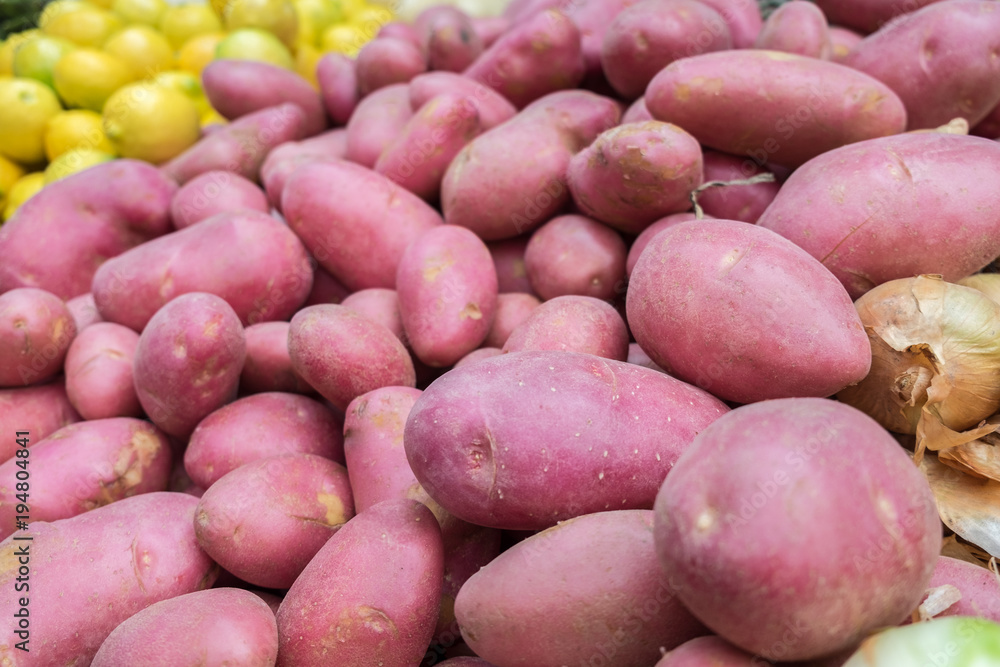 Fresh young red potatoes for sale at city farmers market Fresh young red potatoes for sale at city farmers market