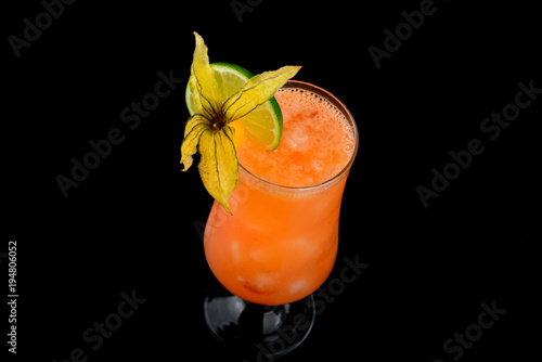 alcoholic cocktail on a black background with insulation photo