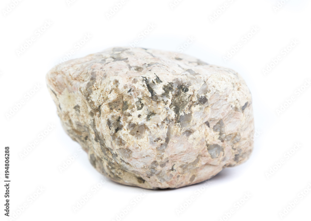 Single natural stone on white background, close-up Single natural stone on white background, close-up