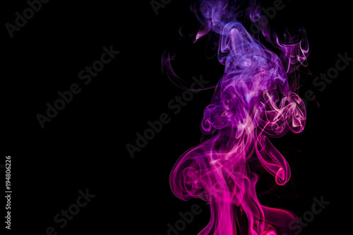 Colored smoke on black background