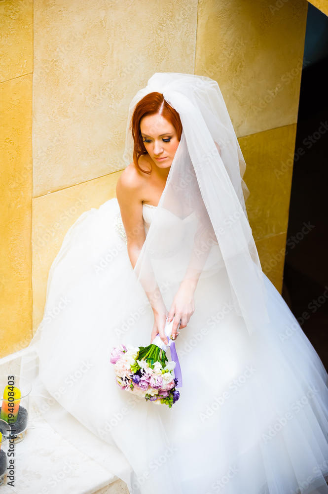Beautiful red hair bride with wedding bouquet Beautiful red hair bride with wedding bouquet
