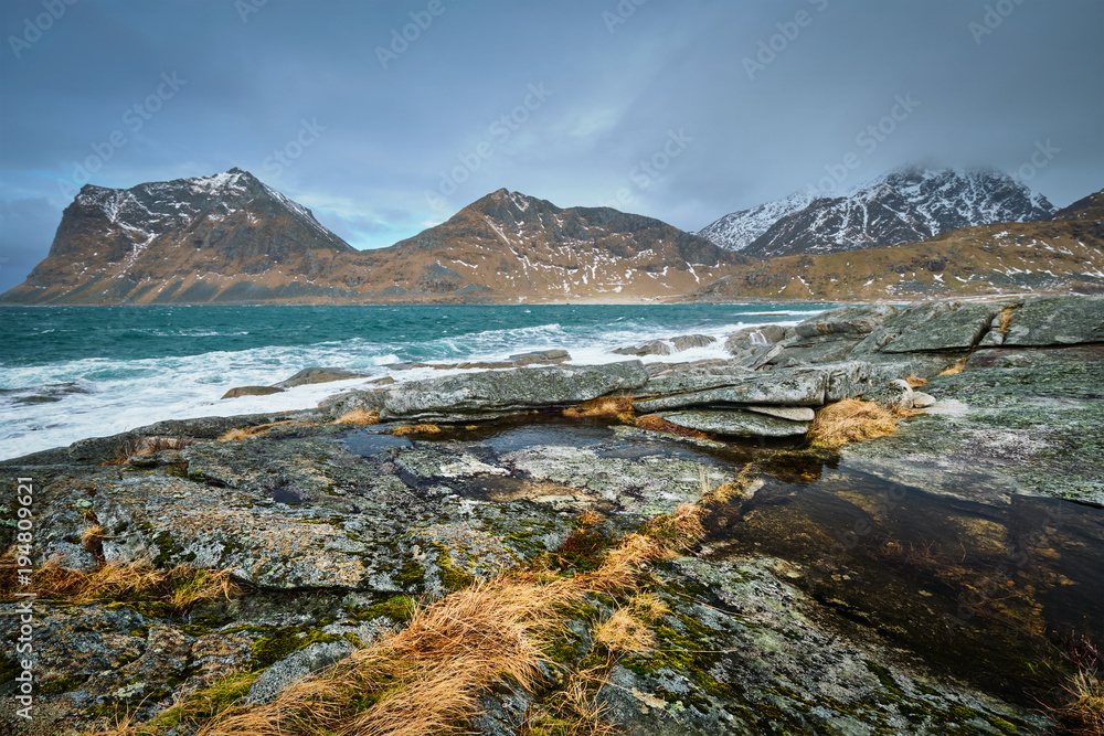 Rocky coast of fjord in Norway Rocky coast of fjord in Norway