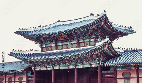 Gate to Gyeongbokgung Palace - writing in Chinese above entrance says - "Geumjeong gate" - not translatable name of a gate"Geumjeong gate" - Seoul, South Korea