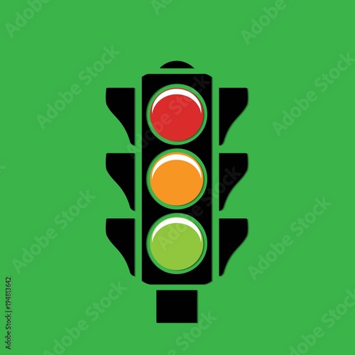 traffic light on a green background