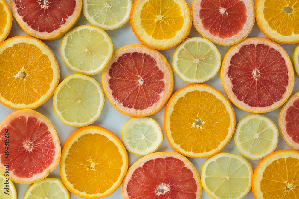 Grapefruit, orange and lemon thinly sliced Grapefruit, orange and lemon thinly sliced