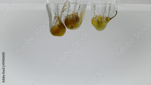 Pears falling into water, Ultra Slow Motion