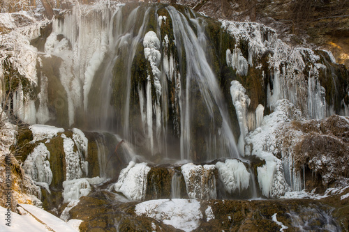 Frozen waterfall in mountains © tempisch
