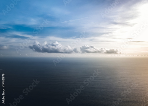 beautiful clouds over the sea at sunset .the view from the top