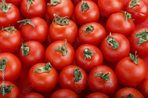  Fresh tomatoes. It can be used as background. (selective focus).Delicious red tomatoes.